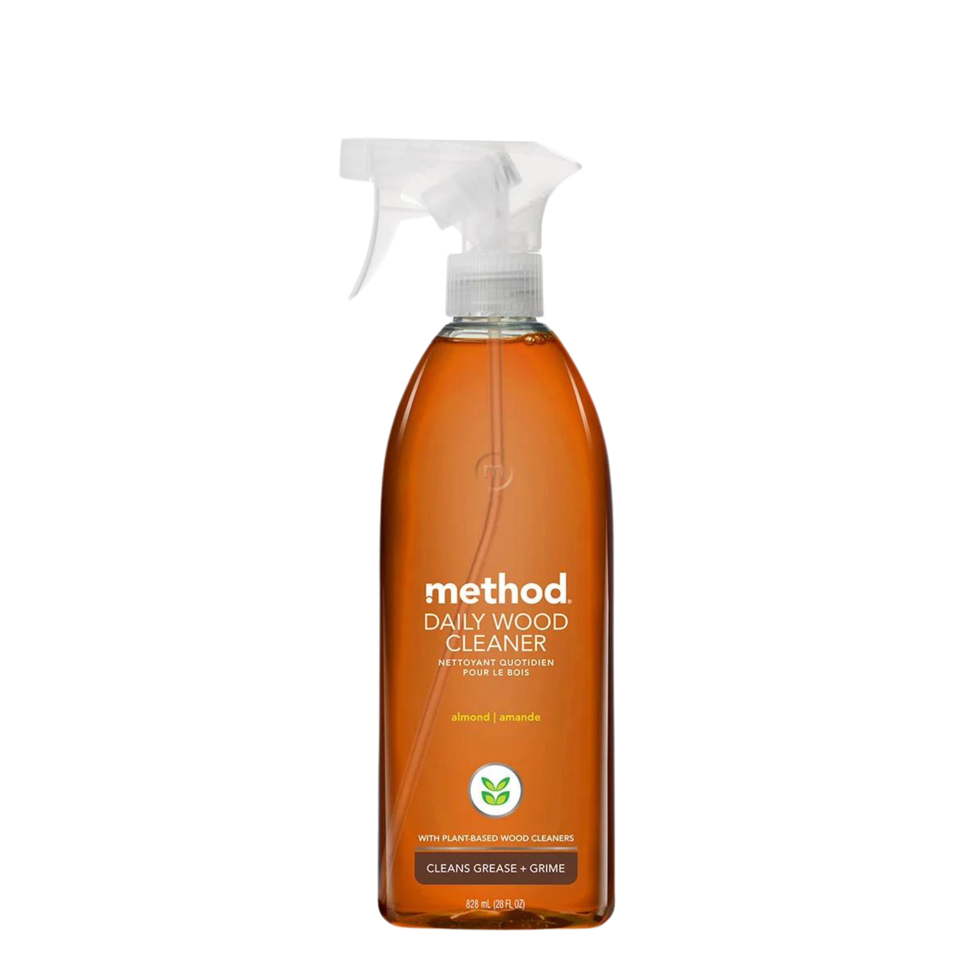 A bottle of Method Daily Wood Cleaner with a spray nozzle, filled with an amber-colored cleaning solution. The label indicates it is an almond-scented cleaner with plant-based wood cleaners, designed to clean grease and grime. 